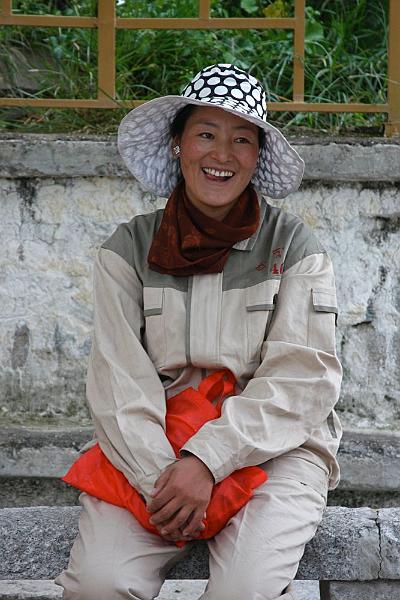 033 Happy to sweep stairs, equally happy to rest.jpg